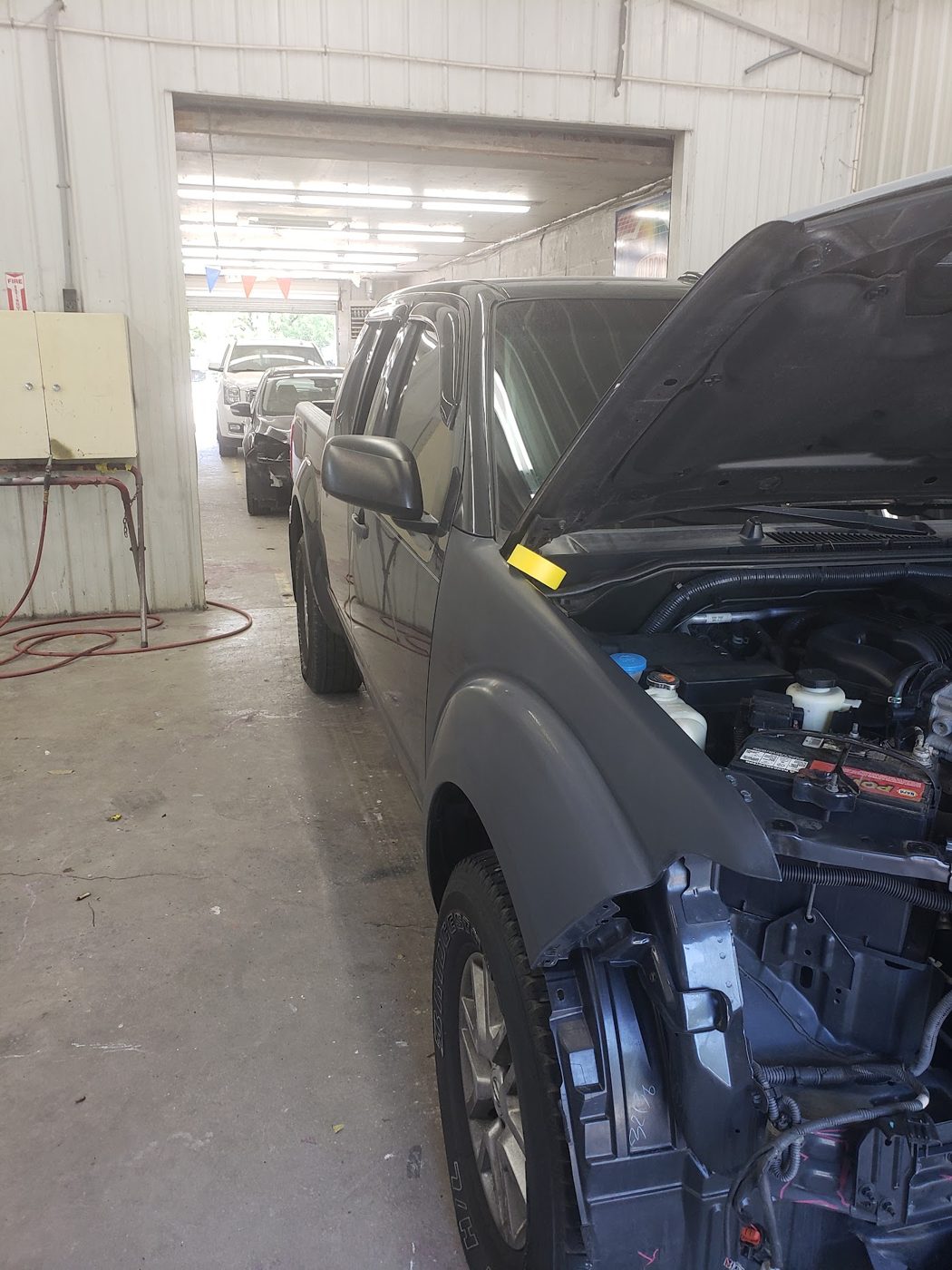 Vehicle in the repair bay